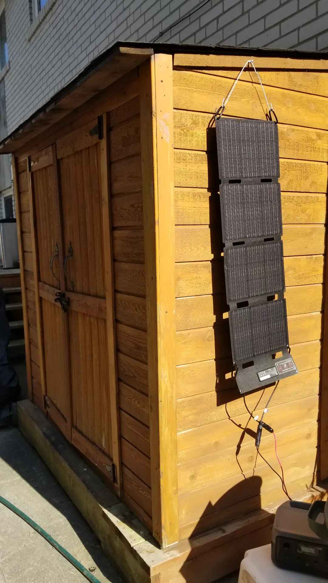 My Baby Solar Panel Hung on my Baby Shed Charging my Baby Power Station